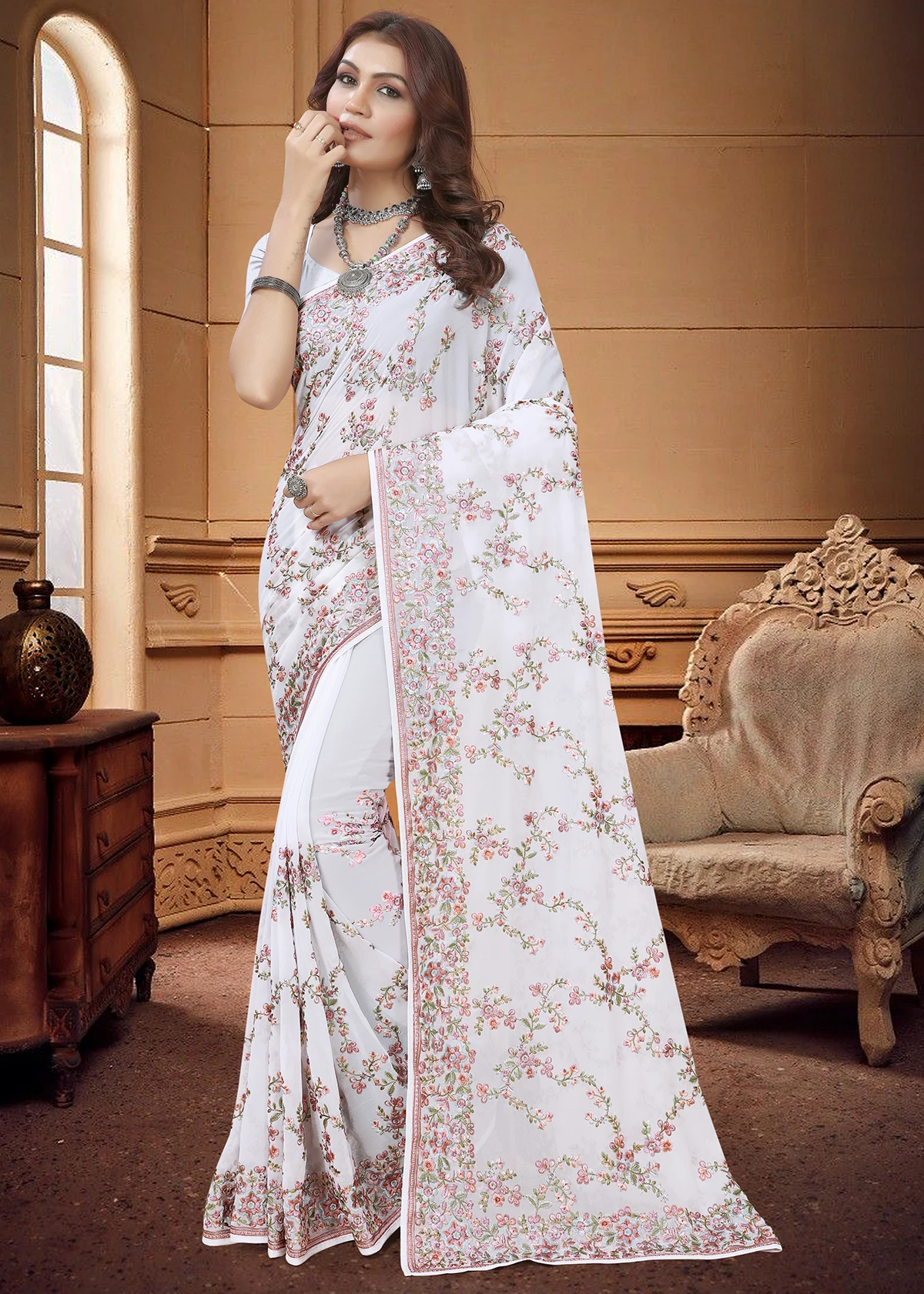 White deals embroidered saree