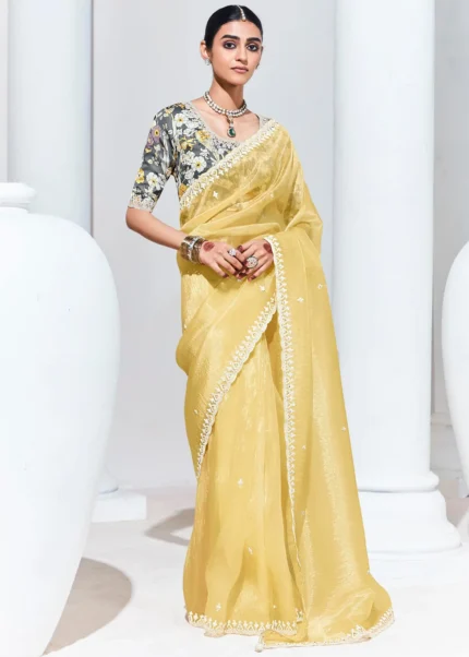 Pastel Yellow Embroidered Organza Silk Saree